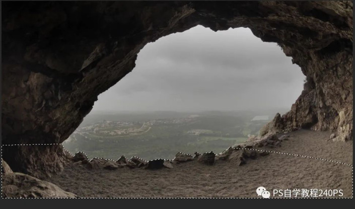 Photoshop创意合成一个小姑娘在岩石洞口欣赏美景的场景。