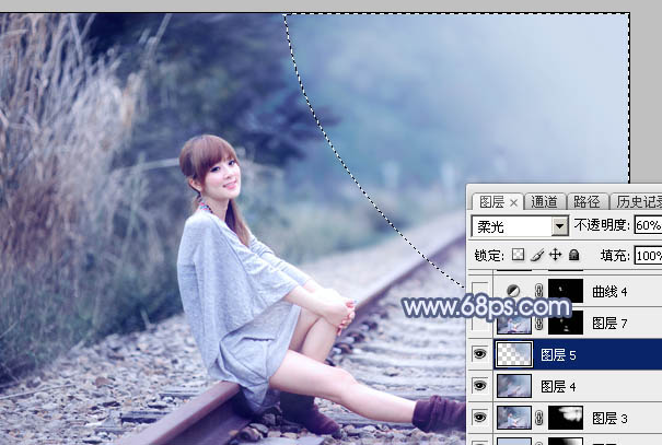 Photoshop为铁轨上的美女加上梦幻甜美的蓝色效果