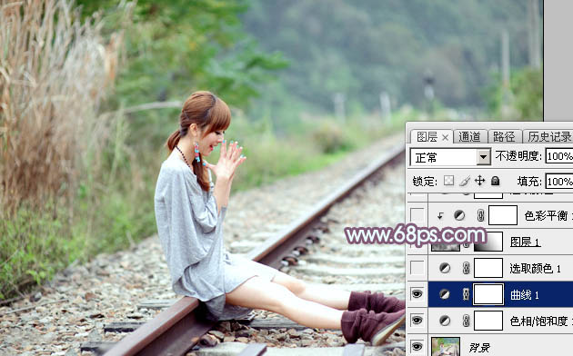 Photoshop给铁轨上的美女加上甜美的韩系青蓝色