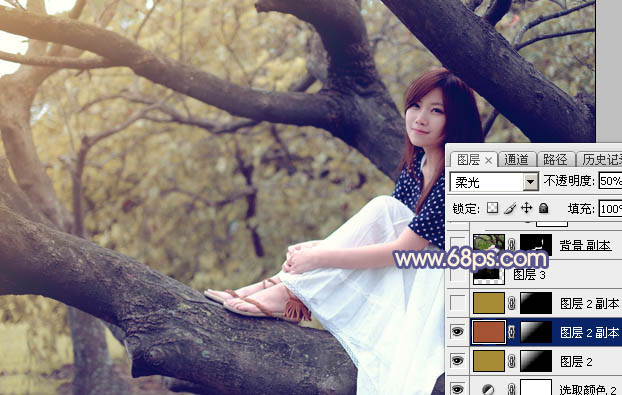 Photoshop为大树上的美女加上秋季晨曦蓝黄色效果