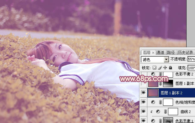 Photoshop将躺草地上的美女打造出柔和的秋季红褐色