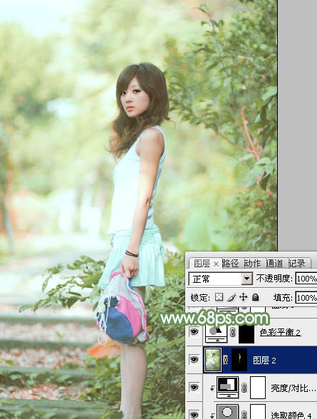 Photoshop将树边美女图片调制出唯美的淡调嫩绿色