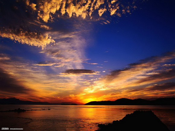 Photoshop将海边美女图片打造出梦幻的夕阳背景