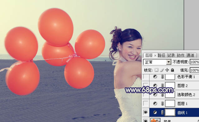 Photoshop将海景婚片调制出柔美的蓝橙色的背景