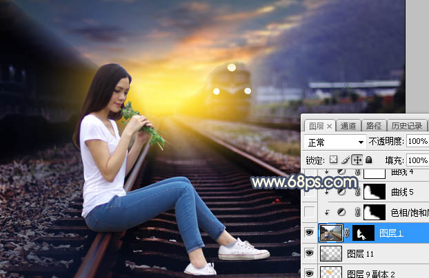 Photoshop调制出唯美的晨曦铁轨上的人物图片