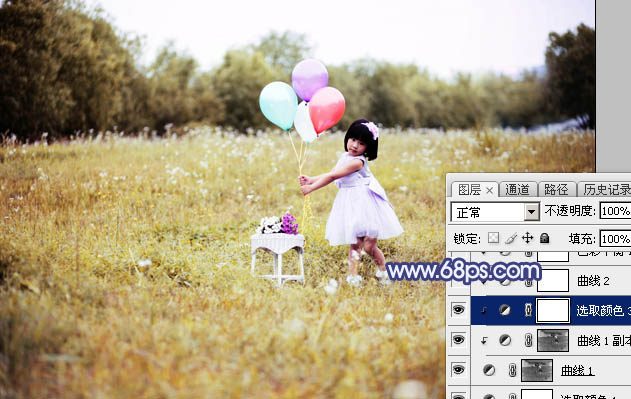 Photoshop调出梦幻的蓝红色霞光草地上的女孩图片
