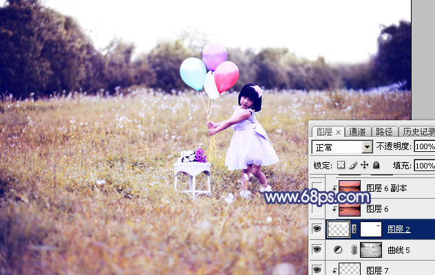 Photoshop调出梦幻的蓝红色霞光草地上的女孩图片