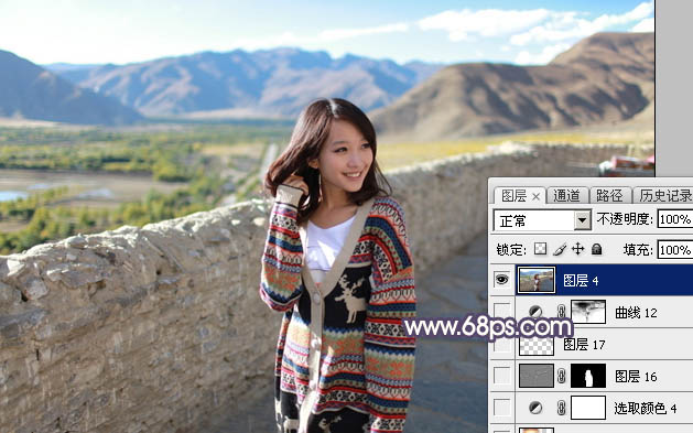 Photoshop将高原山区人物图片调至出灿烂的霞光色