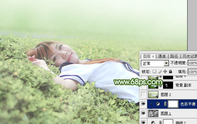 Photoshop将草地上的美女图片增加唯美的春季粉绿色