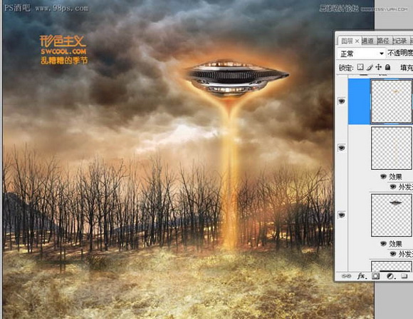 Photoshop合成制作出飞碟袭击地球森林中的火焰燃烧场面海报