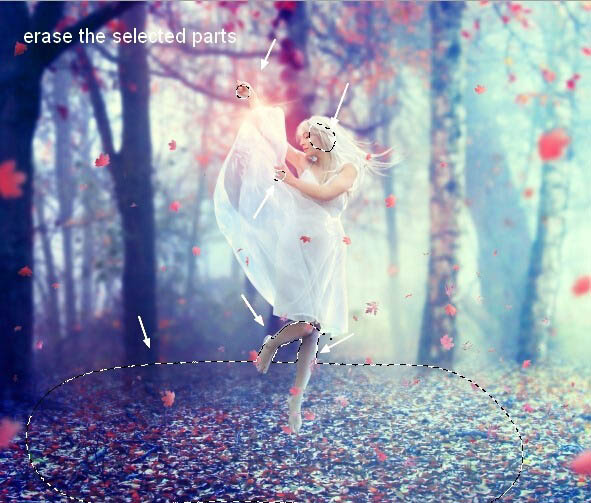 PS合成在唯美的秋色树林中舞动的白衣美女
