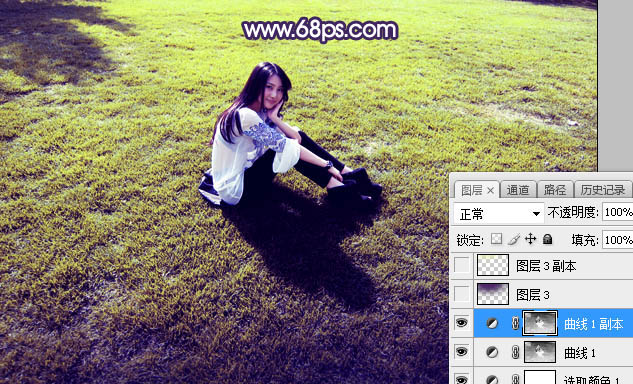 用PS调制唯美紫蓝色草地上的女孩照片