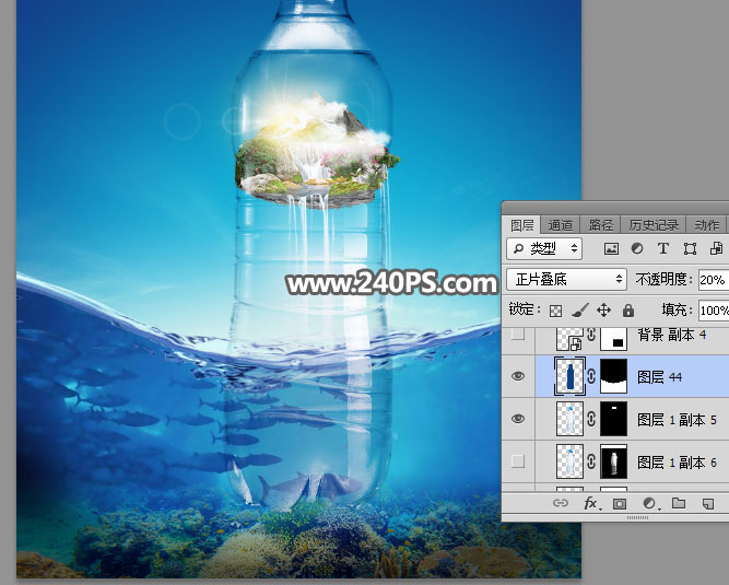 PS合成海面上巨大矿泉水瓶中的海岛图片
