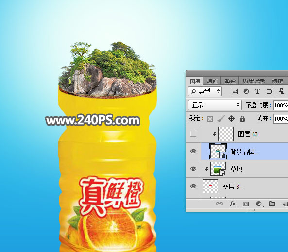 PS合成橙汁饮料瓶中长出的果树图片