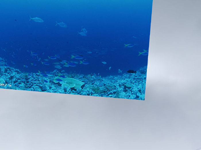 PS合成玻璃灯泡中的微缩大海垂钓图片