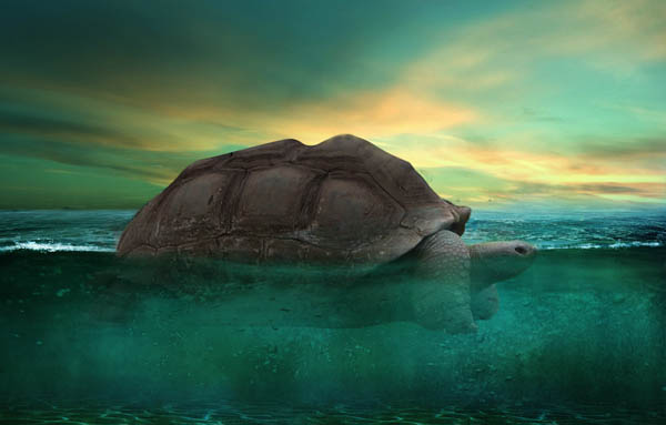 用PS合成拖着大山游泳的大海龟图片