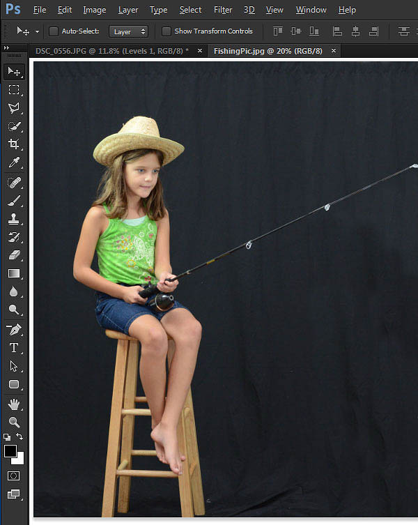 用PS合成坐在树叶上钓鱼的小女孩照片