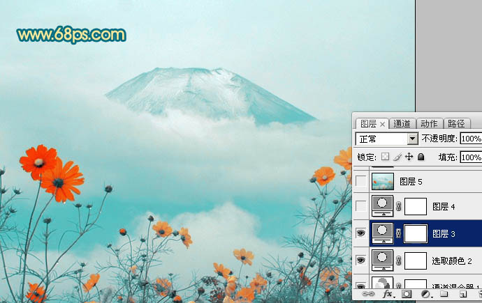 打造青色非主流云雾环绕的山峰照片